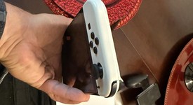 Mint
													Nintendo Switch - OLED - White, 64 GB, photo 3 of 11