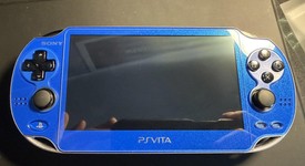 Mint
													PlayStation Vita, photo 4 of 17