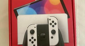 Mint
													Nintendo Switch - OLED - White, 64 GB, photo 5 of 10