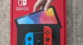 New
													Nintendo Switch - OLED - Red & Blue, 64 GB, photo 3 of 3