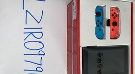 New
													Nintendo Switch - Red & Blue, 32 GB, photo 4 of 11