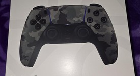 New
													DualSense Wireless Controller - Camo, photo 1 of 3