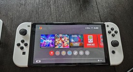 Mint
													Nintendo Switch - OLED - Black, 64 GB, Super Smash Bros., photo 2 of 10