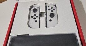 New
													Nintendo Switch - OLED - White, 64 GB, photo 3 of 3