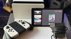 Mint
													Nintendo Switch - OLED - White, 64 GB, photo 1 of 7