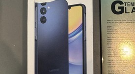 New
													Samsung Galaxy A15 5G - Metro by T-Mobile, Black & Blue, 64 GB, 4 GB, photo 1 of 4