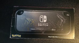 New
													Nintendo Switch Lite - Gray, Dialga & Palkia Edition, photo 5 of 6