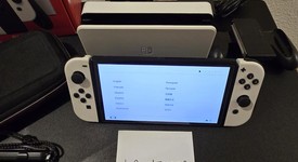 Mint
													Nintendo Switch - OLED - White, 64 GB, photo 2 of 7