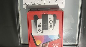 Mint
													Nintendo Switch - OLED - White, 64 GB, photo 5 of 12