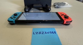 Good
													Nintendo Switch - OLED - Black, 64 GB, Super Smash Bros., photo 3 of 9
