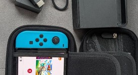 Good
													Nintendo Switch - OLED - Black, 64 GB, Super Smash Bros., photo 3 of 9