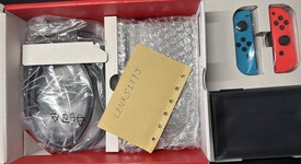 New
													Nintendo Switch - Red & Blue, 32 GB, photo 5 of 8