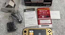 Mint
													Nintendo Switch Lite - Gold, Hyrule Edition, photo 4 of 9