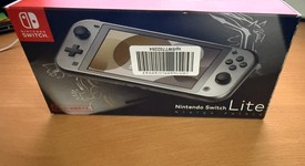 New
													Nintendo Switch Lite - Gray, Dialga & Palkia Edition, photo 5 of 15