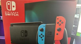 New
													Nintendo Switch - Red & Blue, 32 GB, photo 1 of 3