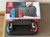 Mint Nintendo Switch - Red & Blue, 32 GB