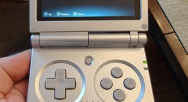 Mint
													Anbernic RG35XXSP - Silver, 64 GB, photo 3 of 10