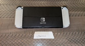 Good
													Nintendo Switch - OLED - Black, 64 GB, Super Smash Bros., photo 3 of 3
