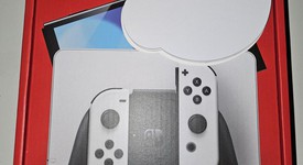 New
													Nintendo Switch - OLED - White, 64 GB, photo 1 of 3