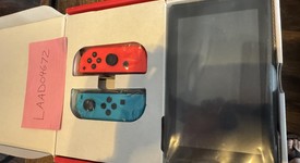 New
													Nintendo Switch - Red & Blue, 32 GB, photo 2 of 4