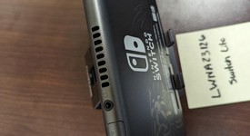 Good
													Nintendo Switch Lite - Gray, Dialga & Palkia Edition, photo 4 of 9