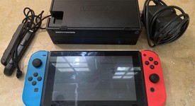 Mint
													Nintendo Switch - Red & Blue, 32 GB, photo 1 of 5