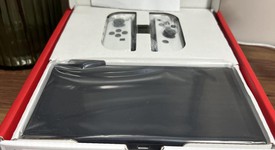 New
													Nintendo Switch - OLED - White, 64 GB, photo 6 of 6