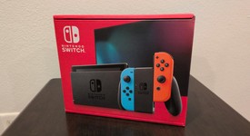 New
													Nintendo Switch - Red & Blue, 32 GB, photo 1 of 4