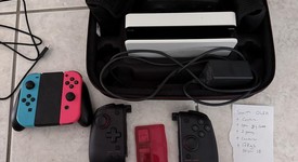 Mint
													Nintendo Switch - OLED - Red & Blue, 64 GB, photo 1 of 6