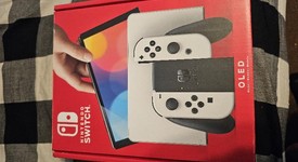 Mint
													Nintendo Switch - OLED - White, 64 GB, photo 2 of 11
