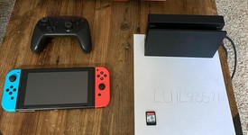 Mint
													Nintendo Switch - Red & Blue, 32 GB, photo 1 of 1