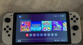 Mint
													Nintendo Switch - OLED - White, 64 GB, photo 4 of 7