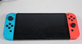 Good
													Nintendo Switch - OLED - Red & Blue, 64 GB, photo 4 of 4