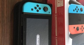 Mint
													Nintendo Switch - Red & Blue, 32 GB, photo 1 of 7