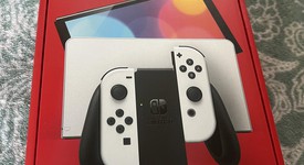 New
													Nintendo Switch - OLED - White, 64 GB, photo 1 of 5