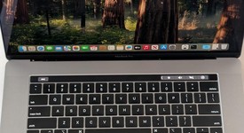 Good
													MacBook Pro 2018 (With Touch Bar) - 15" - I9, Gray, 1 TB, 32 GB, photo 1 of 9