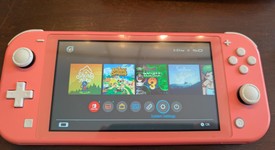 Mint
													Nintendo Switch Lite - Coral, photo 2 of 8