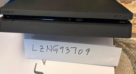 Mint
													PlayStation 4 Slim - Black, 1 TB, photo 4 of 9