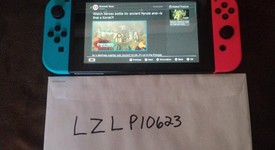 Good
													Nintendo Switch - Red & Blue, 32 GB, photo 1 of 3