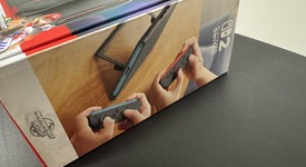 New
													Nintendo Switch 2 - Red & Blue, Standard, photo 2 of 5