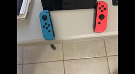 Mint
													Nintendo Switch - OLED - Red & Blue, 64 GB, photo 5 of 9
