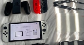 Mint
													Nintendo Switch - OLED - White, 64 GB, photo 3 of 9