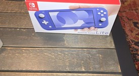 New
													Nintendo Switch Lite - Blue, photo 4 of 5