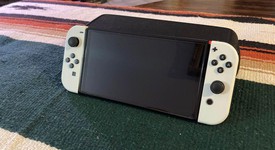 Mint
													Nintendo Switch - OLED - White, 64 GB, photo 5 of 9