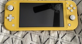 Mint
													Nintendo Switch Lite - Yellow, photo 1 of 9