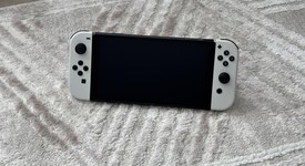 Mint
													Nintendo Switch - OLED - White, 64 GB, photo 3 of 15