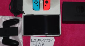 Mint
													Nintendo Switch - OLED - Red & Blue, 64 GB, photo 2 of 9