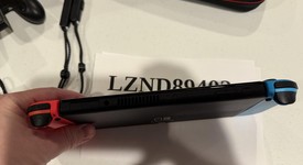 Mint
													Nintendo Switch - OLED - Red & Blue, 64 GB, photo 2 of 7