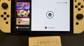 Mint
													Nintendo Switch - OLED - White, 64 GB, photo 2 of 16