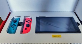 New
													Nintendo Switch - Red & Blue, 32 GB, photo 3 of 3